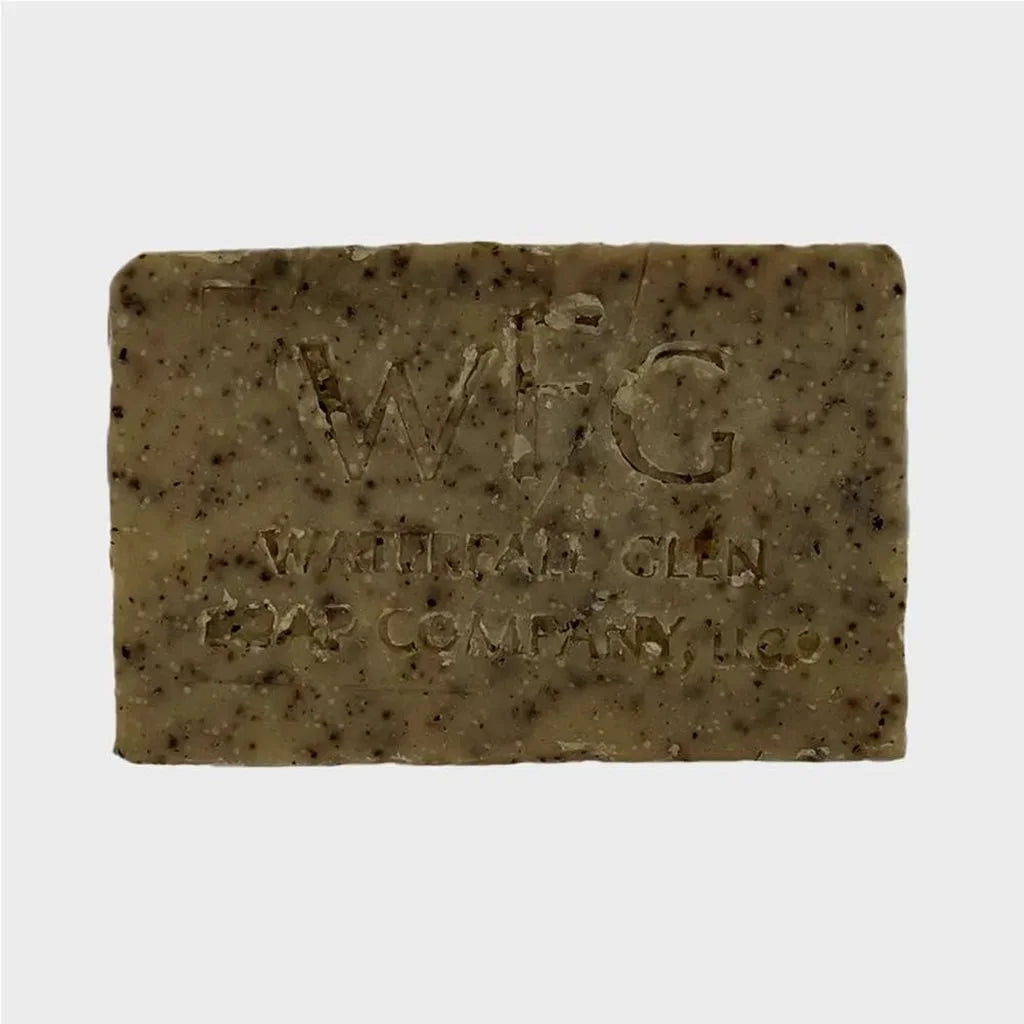 light brown bar soap with multiple dark brown spotting