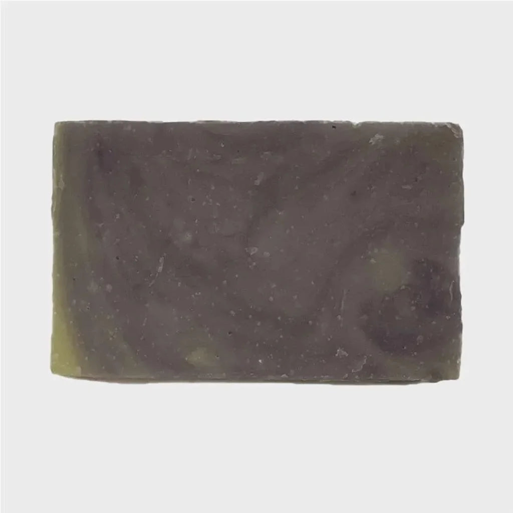 purple colored bar soap with darker purple swirls 