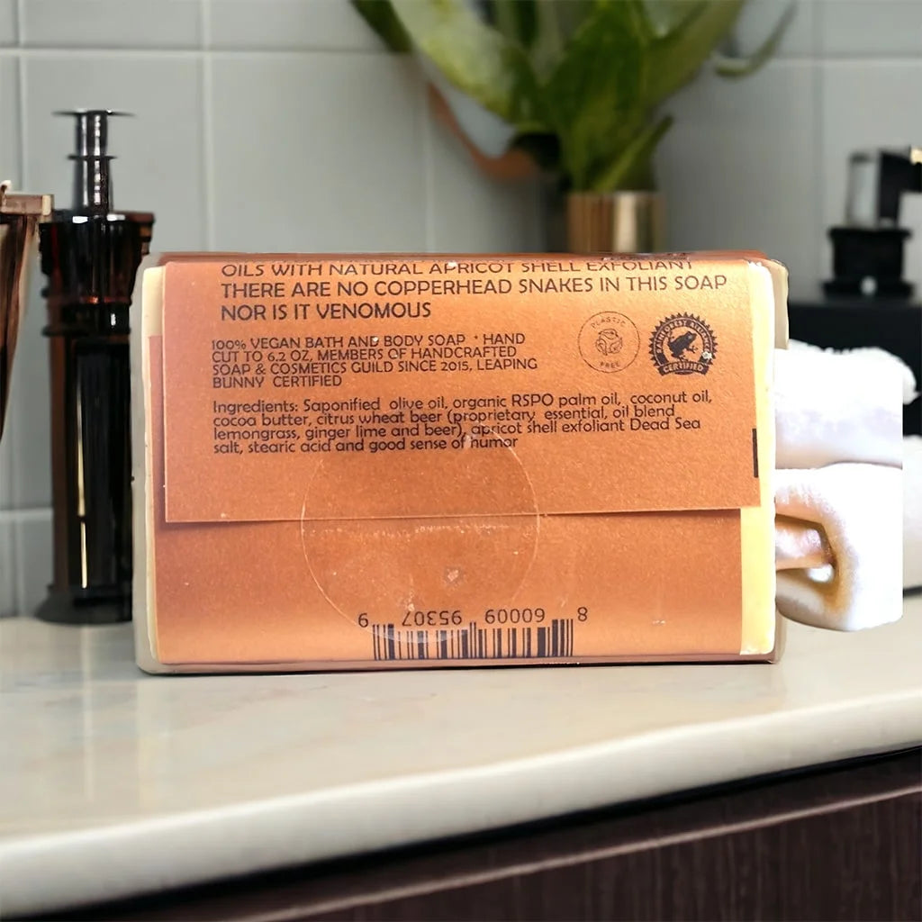 copperhead bar soap, an orange soap wrapper with the display of the ingredients label