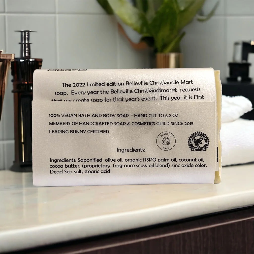 first snow soap with a white wrapper showing the ingredients label