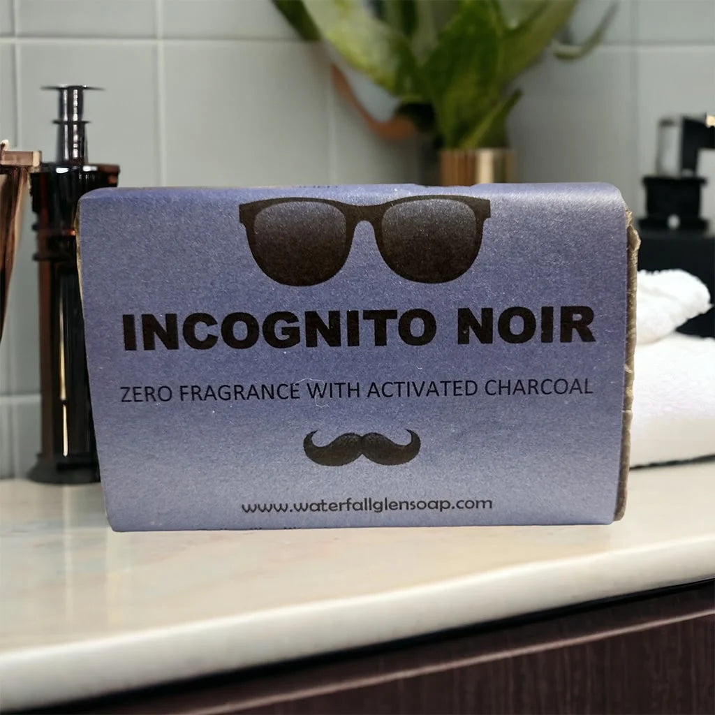 incognito noir vegan bar soap, blue label with sunglasses graphic, dark blue bar soap