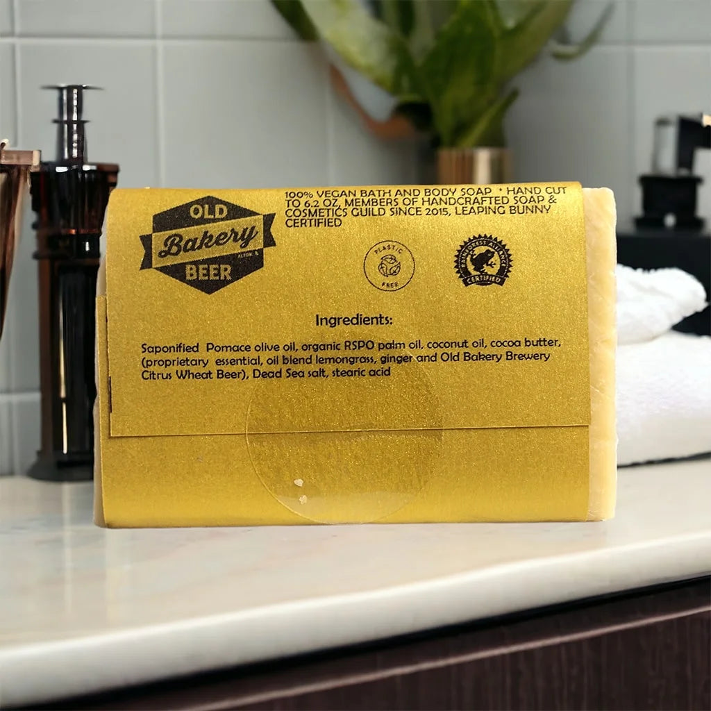 made in shade soap with a yellow wrapping showing the ingredients label