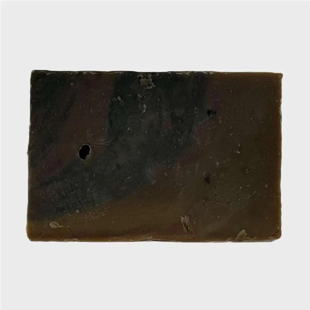 brown and black colored mistique bar soap