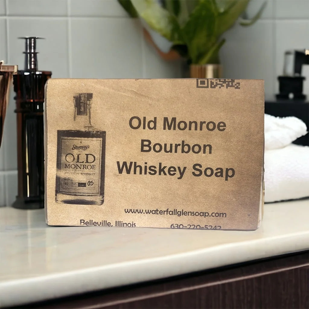 old monroe whiskey, bar soap and monroe whiskey graphic on a brown label